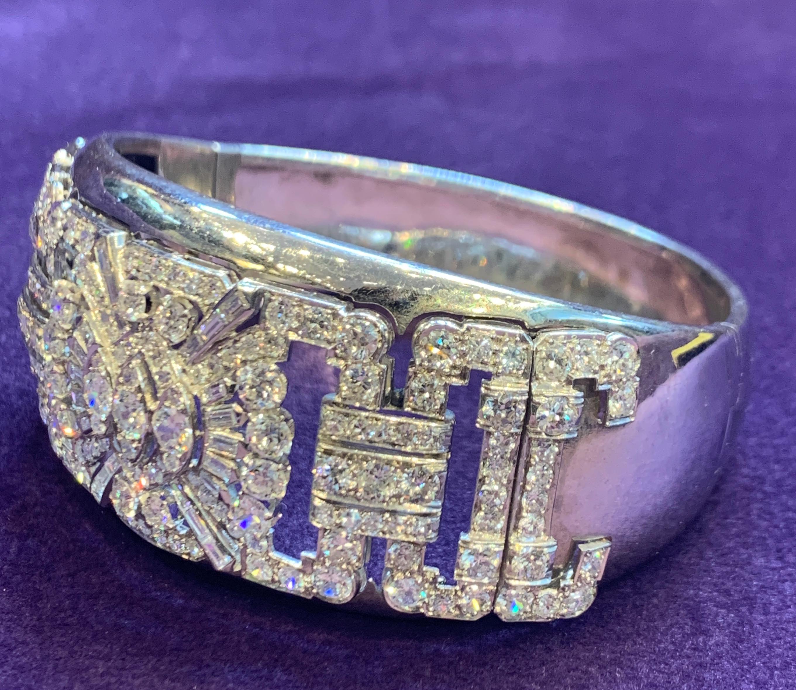 Diamond And White Gold Large Bangle Bracelet
3 centered diamond plaques mounted from the 1940's as a bangle 
14K White Gold
62.7 Grams
7