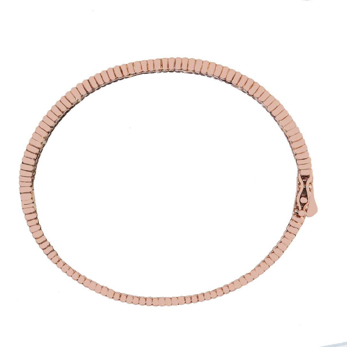 Material: 14k Rose Gold
Diamond Details: Approximately 2.24ctw of round brilliant diamonds. Diamonds are G/H in color and SI in clarity
Wrist size: Will fit up to a 6.75″ wrist
Bracelet Measurements: 6.75″ x 0.35″
Total Weight: 24g (15.5dwt)
SKU: