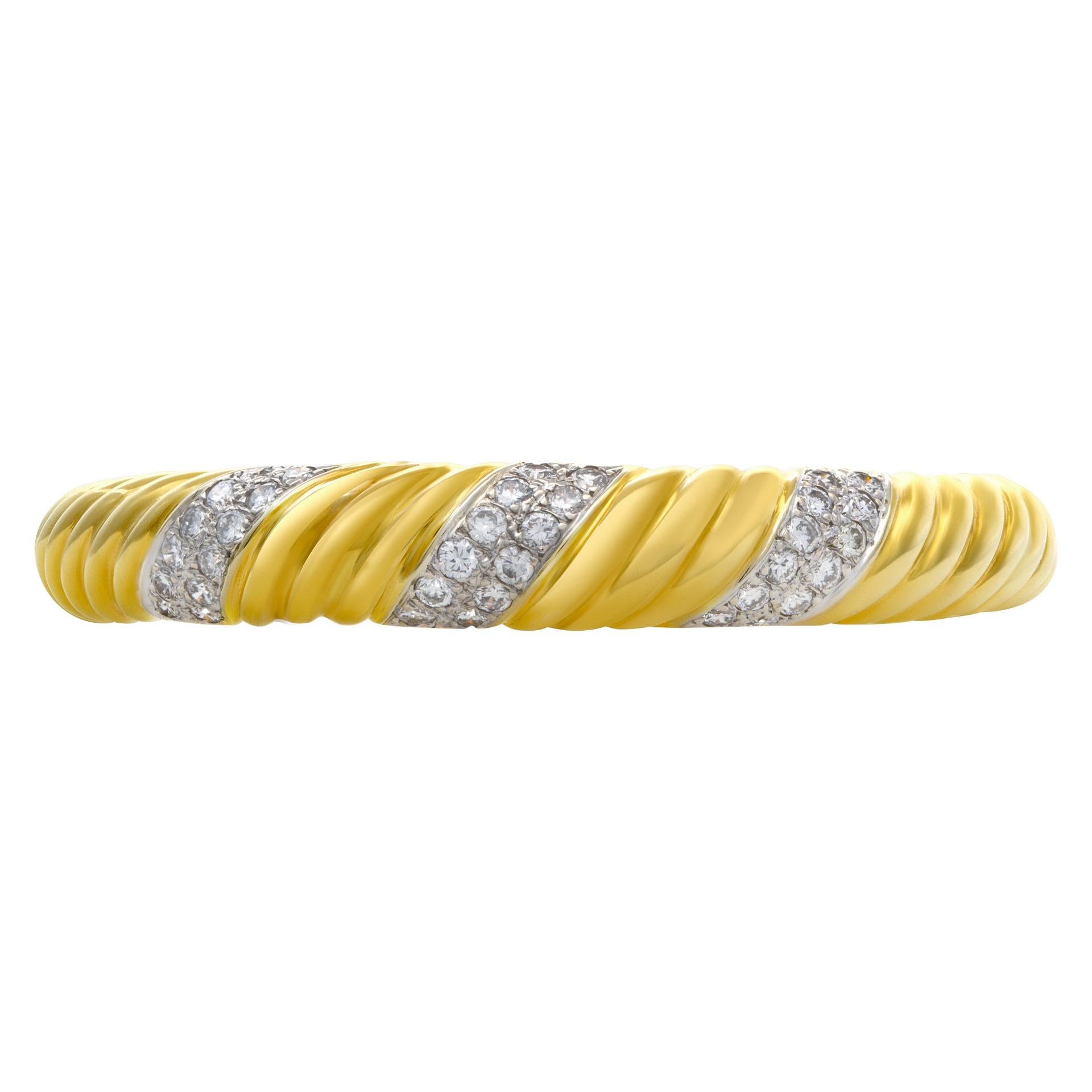 ESTIMATED RETAIL: $6,940 YOUR PRICE: $4,620 - Diamond bangle with approximately 1.80 carats in G-H color VS clarity roun cut diamonds set in 18k yellow gold. Fits 5.5