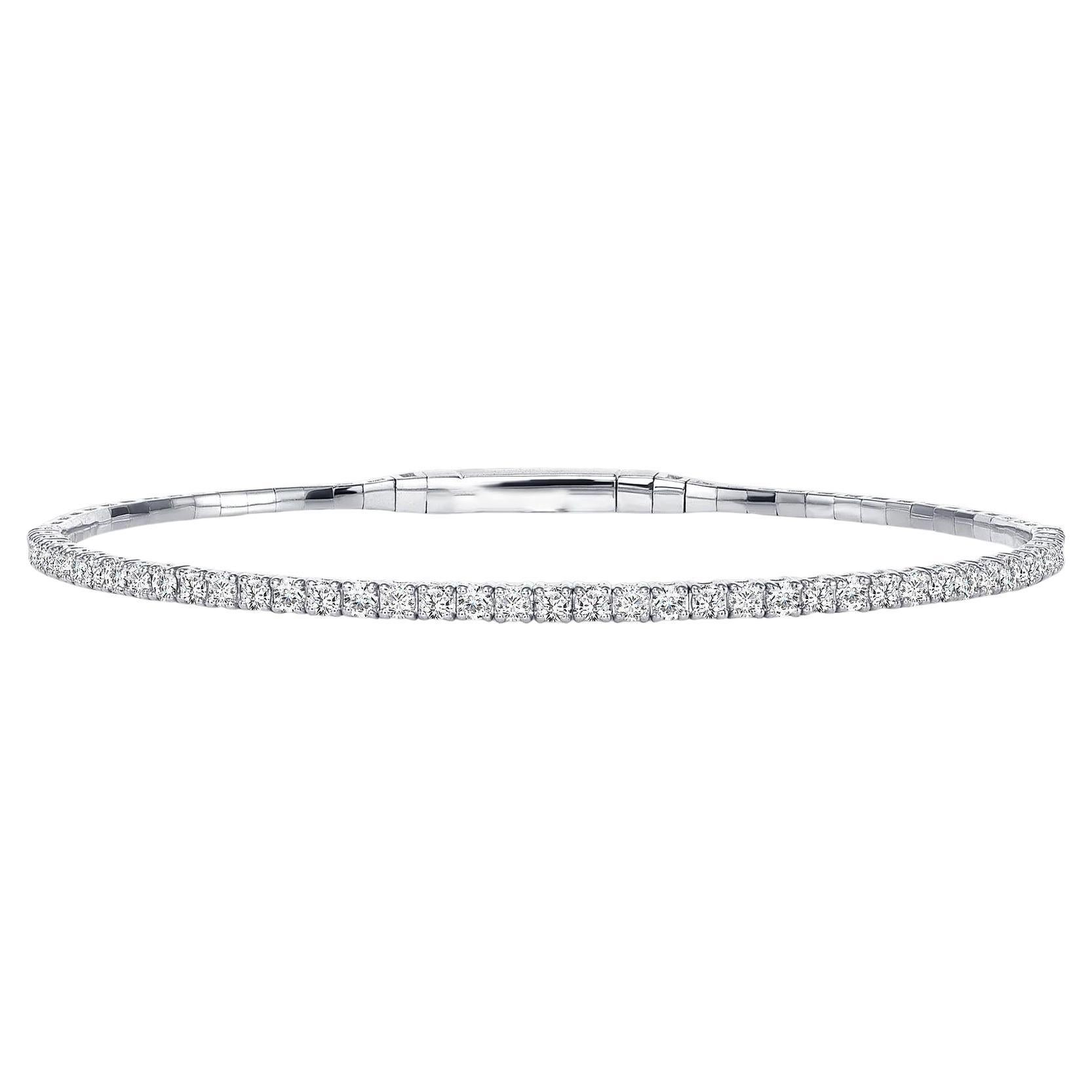 This diamond tennis bangle features beautifully cut round diamonds set gorgeously in 14k gold.

Bracelet Information
Metal : 14k Gold
Diamond Cut : Round Natural Diamond
Total Diamond Carats : 2ct
Diamond Clarity : VS -SI
Diamond Color : F-G
Color :