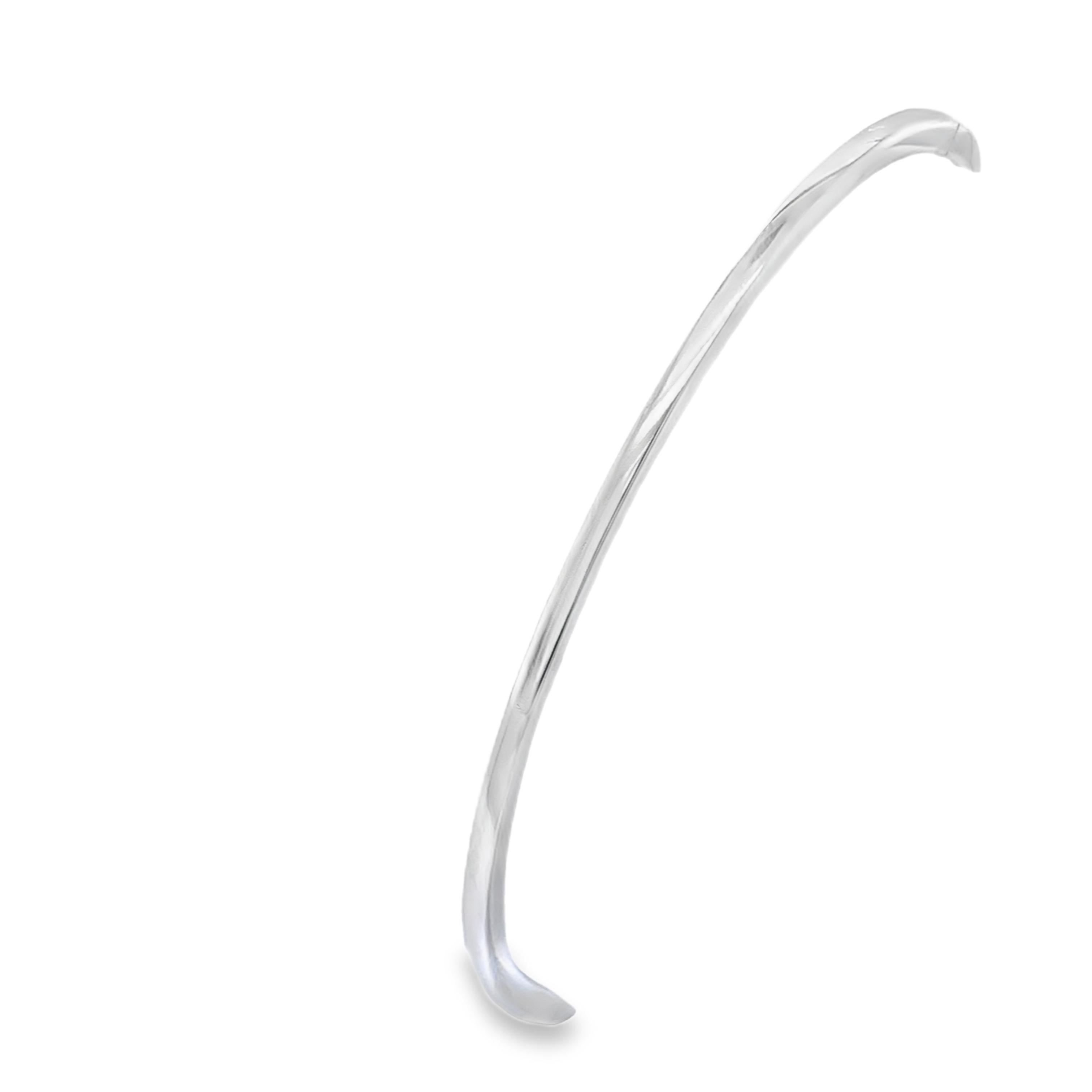 A timeless and elegant diamond bangle crafted in 18ct white gold, set with 0.90ct of natural round brilliant cut diamonds. This classic design offers brilliant sparkle and sophistication for any occasion.

Total weight: 11.66g
Total Diamond Weight: