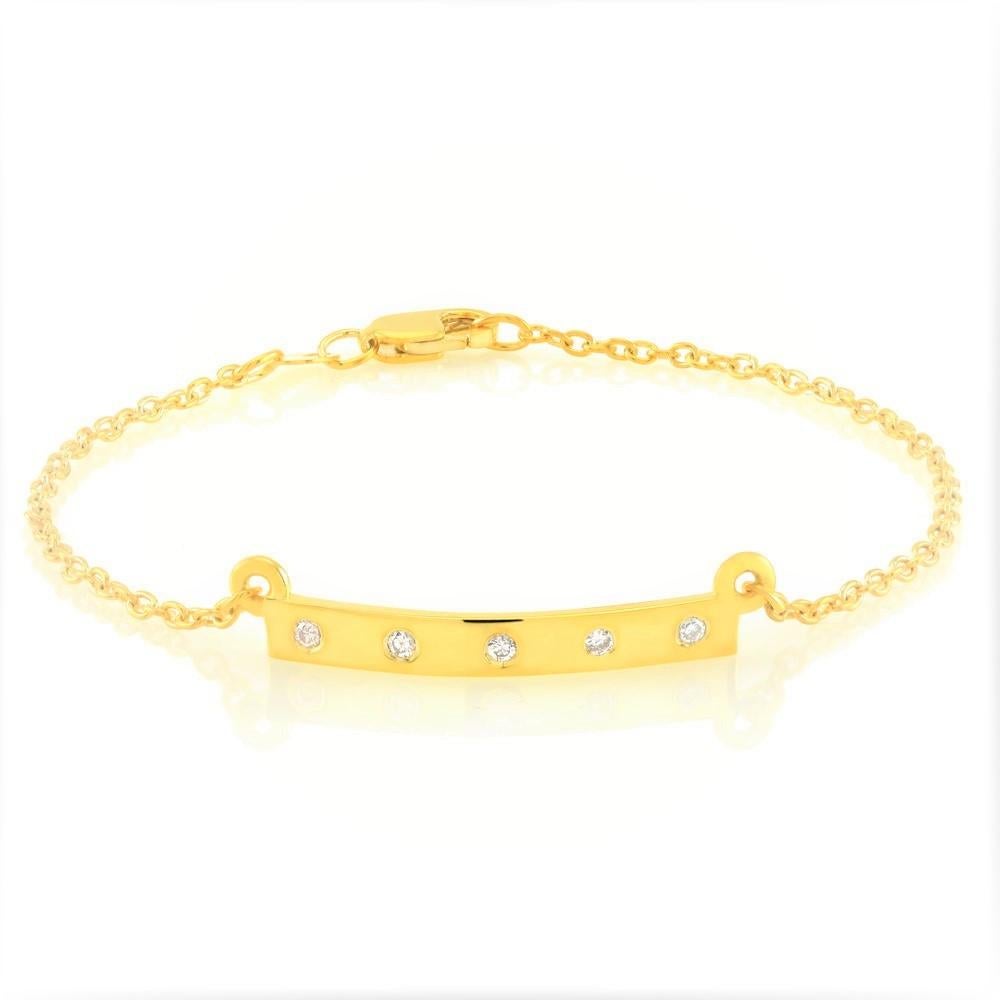 Sterling Silver link bracelet 
Five diamond pave set on one-inch bar 
Lobster claw clasp
Five diamond weighing 0.15 carat 
Bracelet seven inch long 
New bracelet
Yellow gold plated 