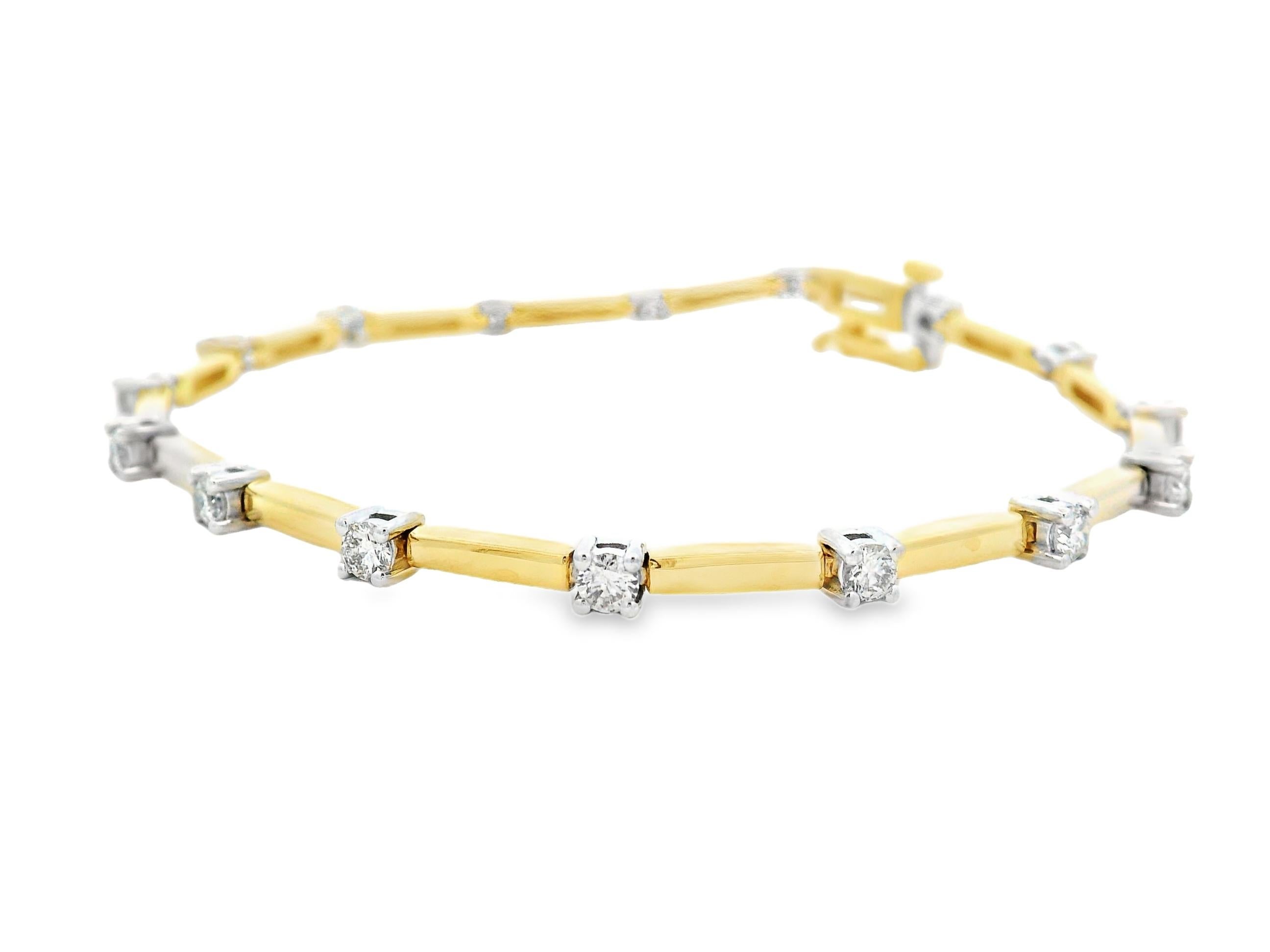This sophisticated diamond bracelet features sixteen round brilliant-cut diamonds totaling approximately 1.25 carats, set within alternating polished yellow and white gold links. Crafted in 14K two-tone gold, the design highlights each diamond in