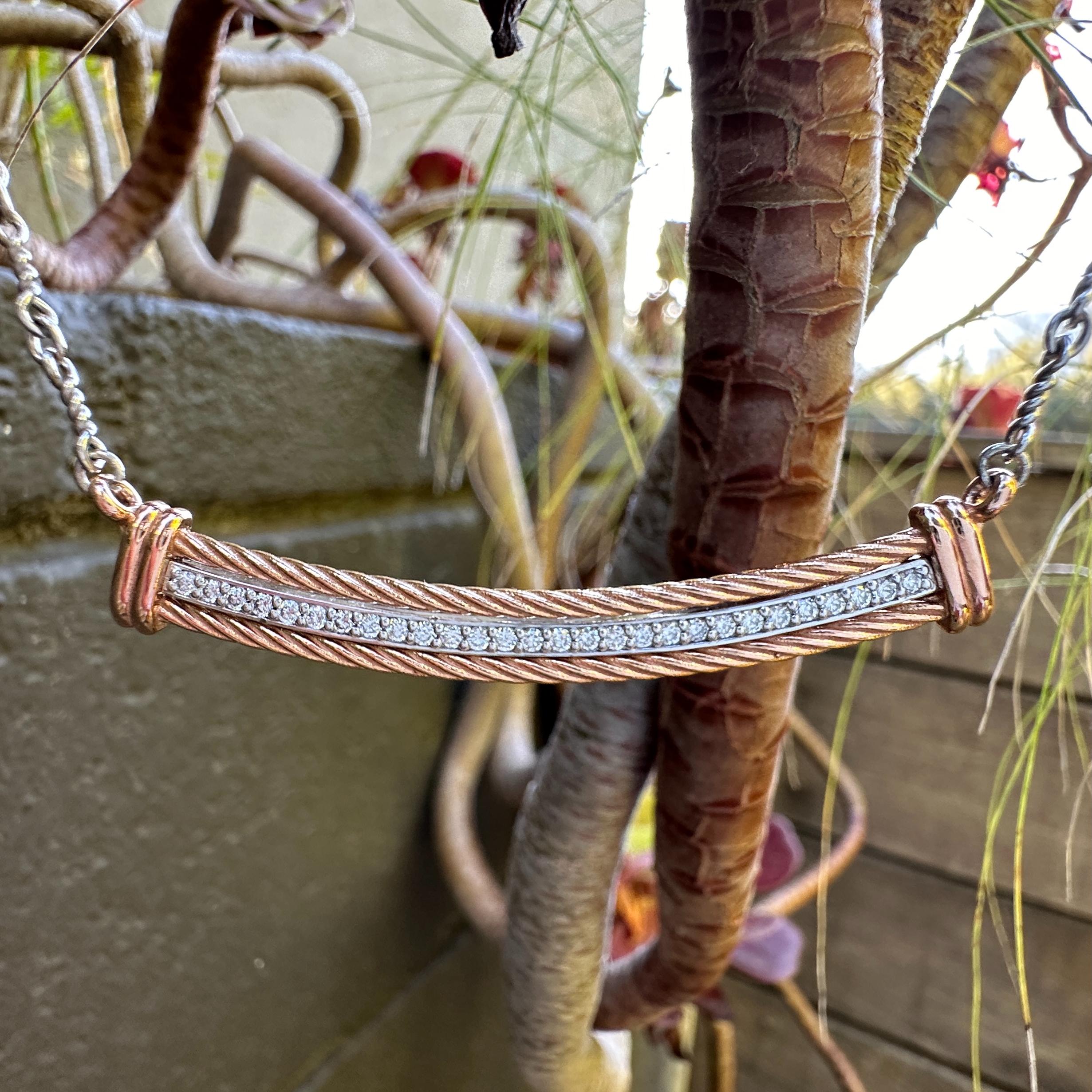 This sexy new necklace by Eytan Brandes is based on a custom 1990's necklace that came through the store a couple of years ago.  Eytan liked the design and made his own version of it.  

Twenty-eight natural white brilliant cut diamonds (rated by