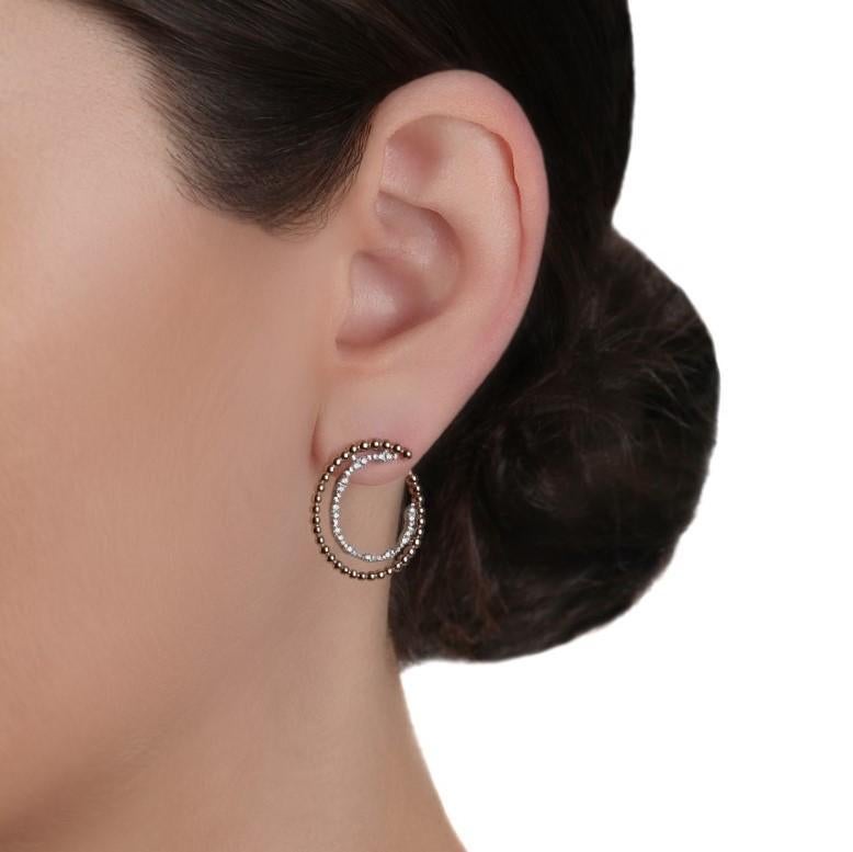 Diamond Beaded Hoop Earrings in 18K White Gold

0.43 Cts of Diamonds, G-H Color, VS-SI Clarity
8.92 Grams of 18K Yellow/White/Rose Gold
Available in other color options: Rose & white gold, yellow & white gold

No two products are exactly same,