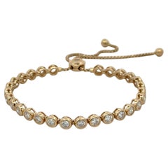 Bracelet Tennis Bolo avec lunette en diamant 2.85 Carats Or jaune 14 carats 2.85 Carats