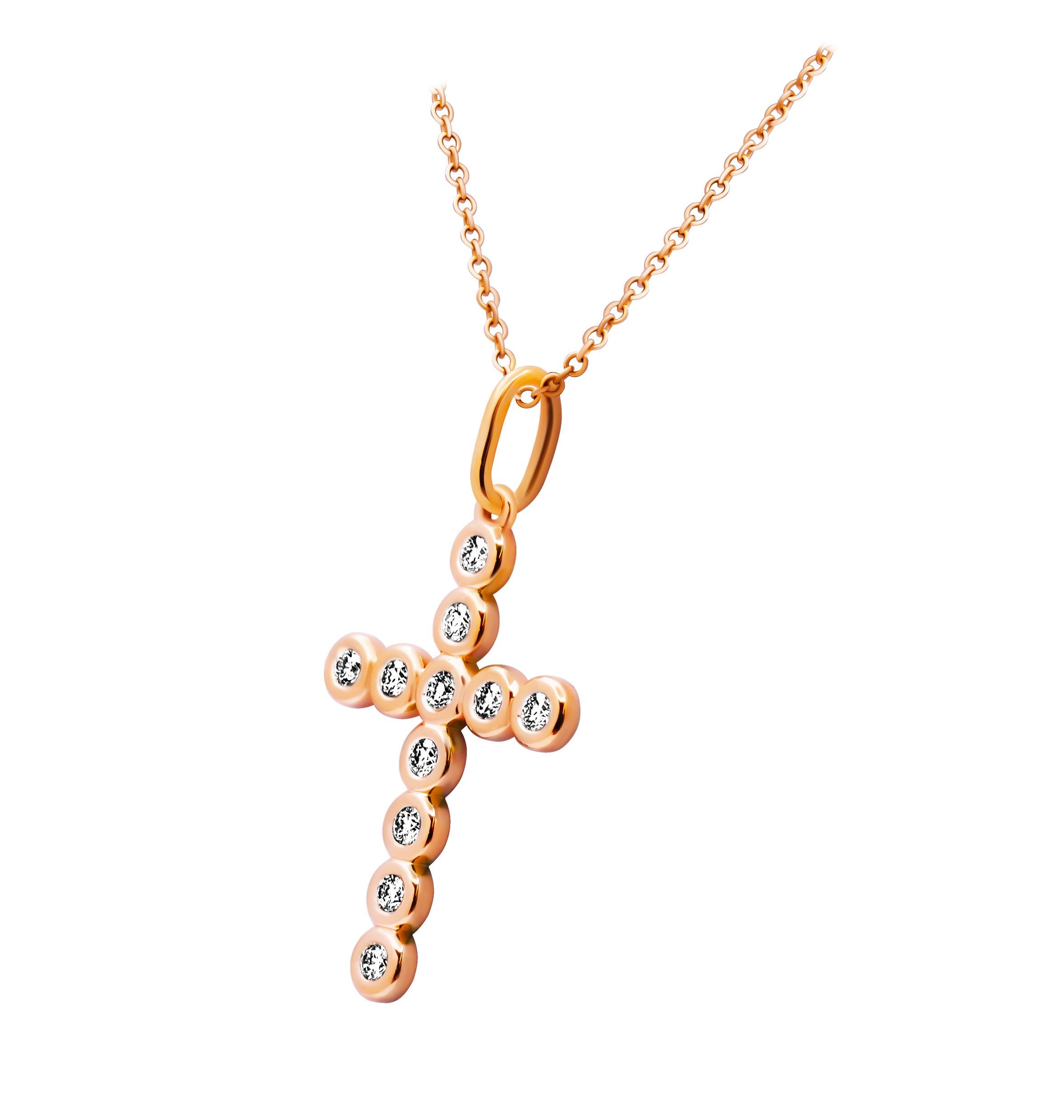 Croce con castone di diamanti in oro rosa 14K
Diamanti di colore F/G, purezza VS, per un totale di 0,52 ct.
su catena da 16 pollici
