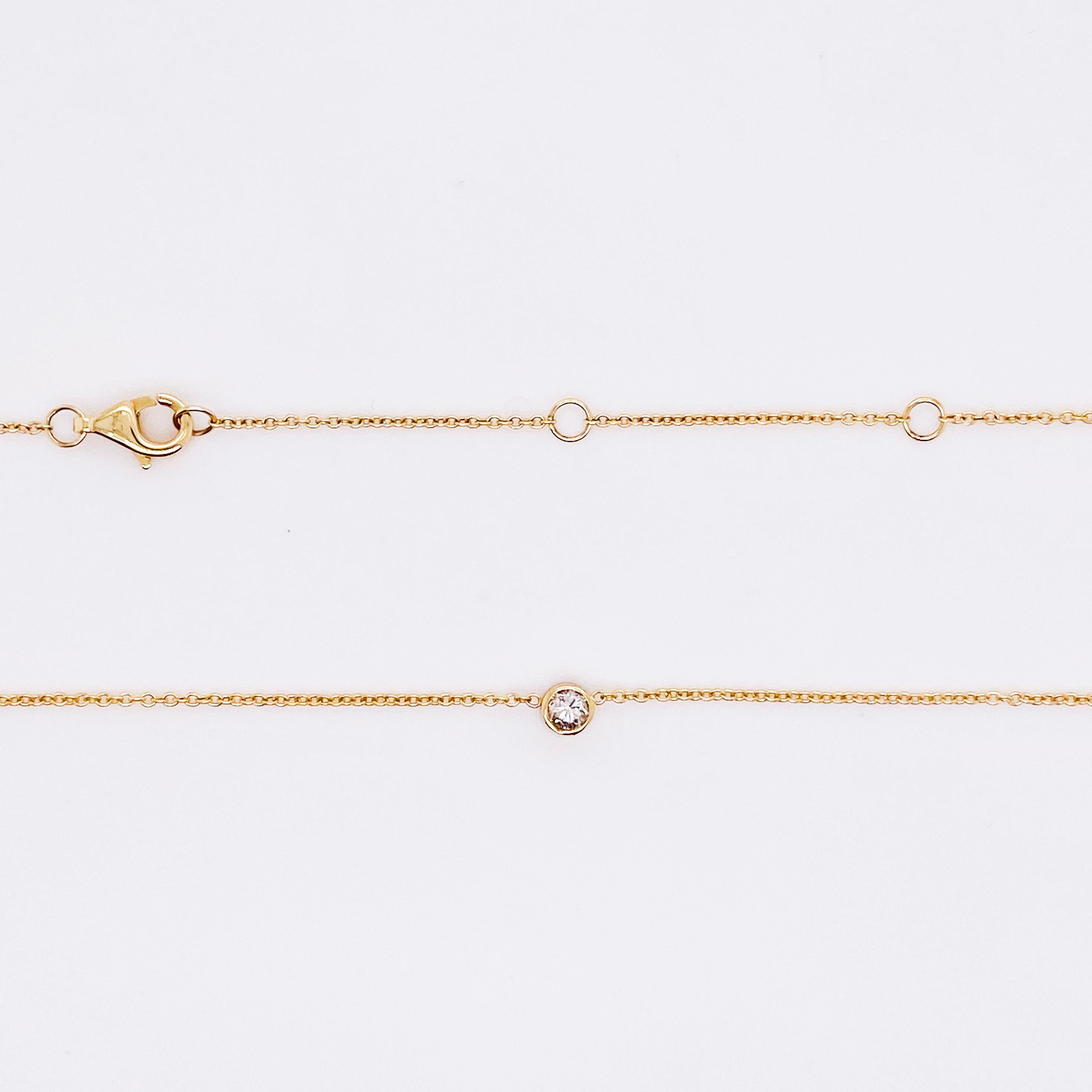 This 14 karat yellow gold diamond bezel necklace is a classic! This simple design is one to be worn everyday and with any outfit.  You can wear it with your finest dress and also in your workout clothes.  The diamond is lovely and shines from any