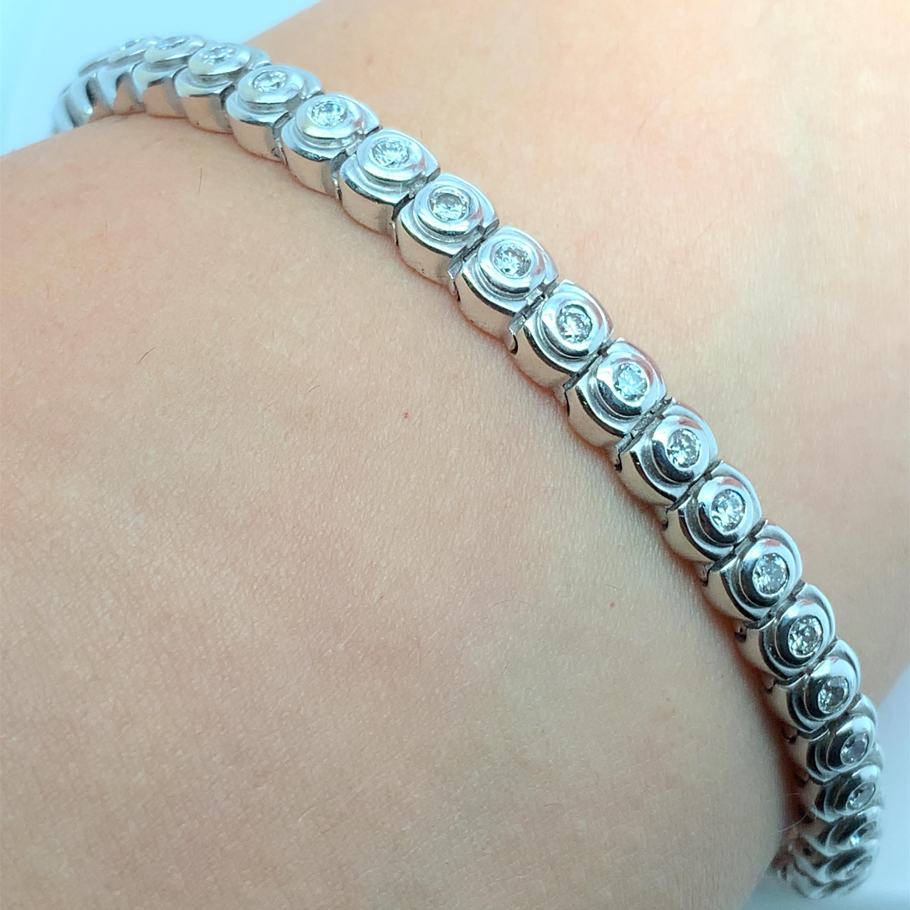 Elevate your jewellery collection with this exquisite 1.70ct Diamond Tennis Bracelet Eternity Bezel from the renowned brand Eternity. Crafted from 18ct White Gold, this bracelet features a stunning round-shaped diamond with a total carat weight of