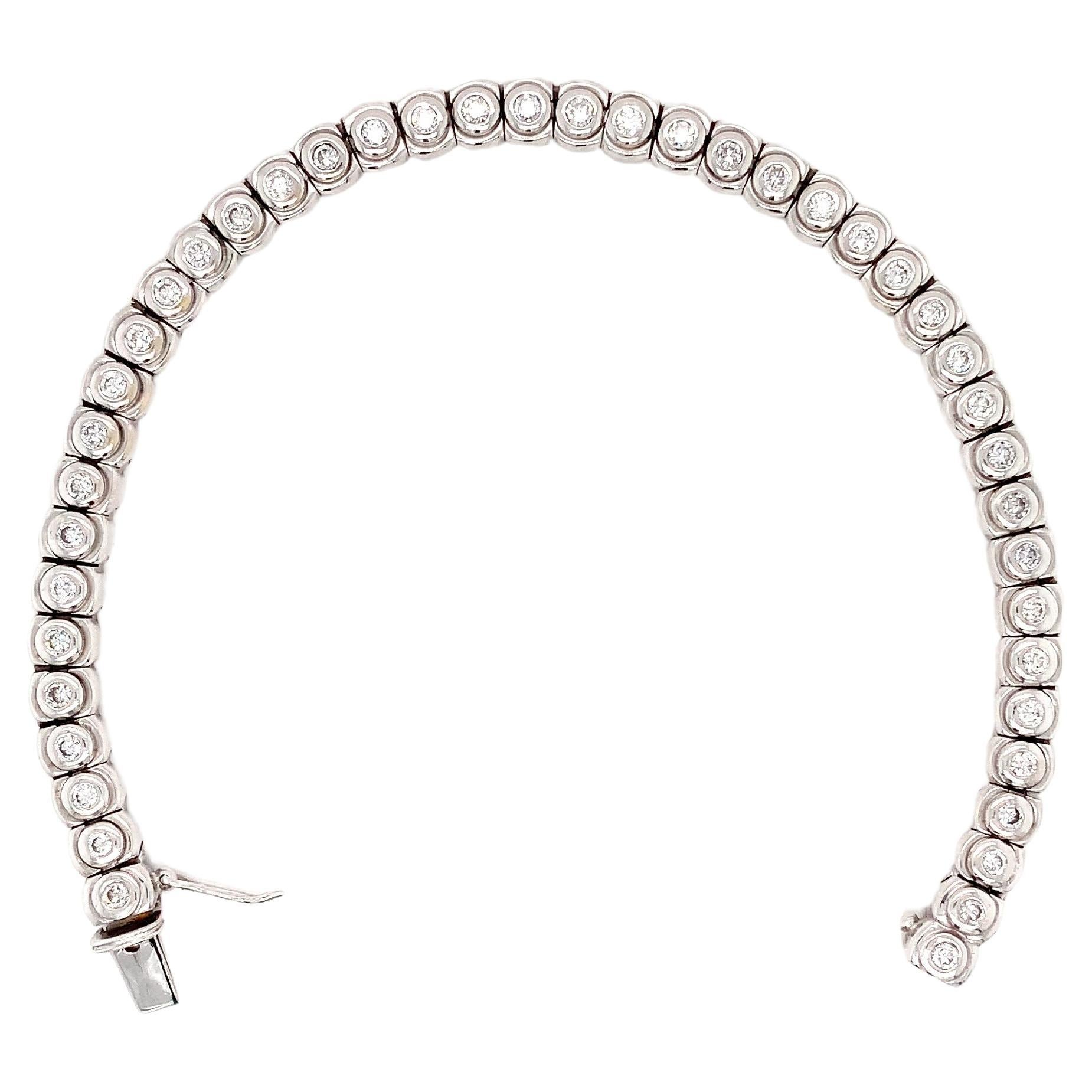 Diamond bezel rub over tennis bracelet 18k white gold