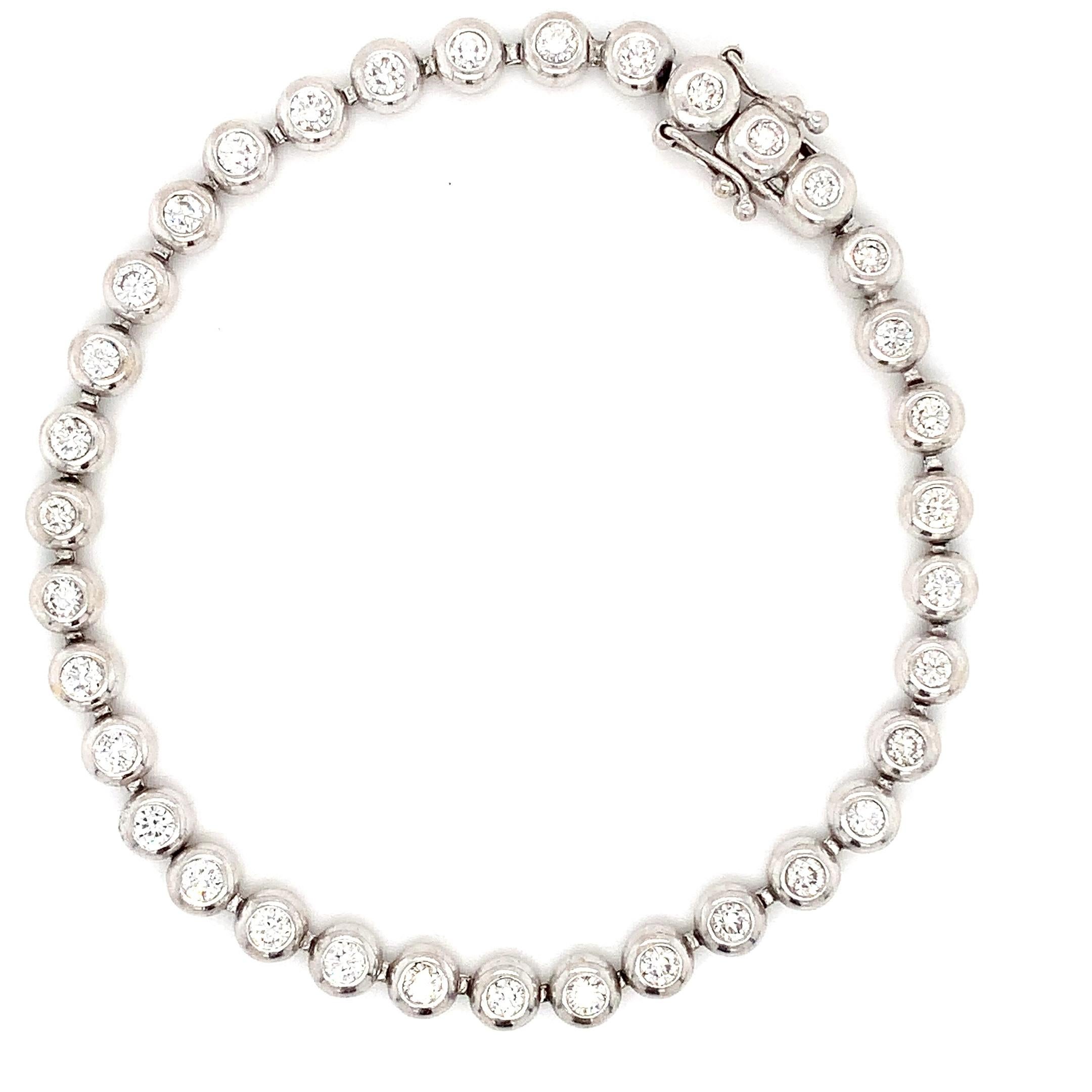 Round Cut Diamond bezel rubover tennis bracelet 18k white golst For Sale