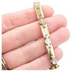 Bracelet en or bicolore serti de diamants