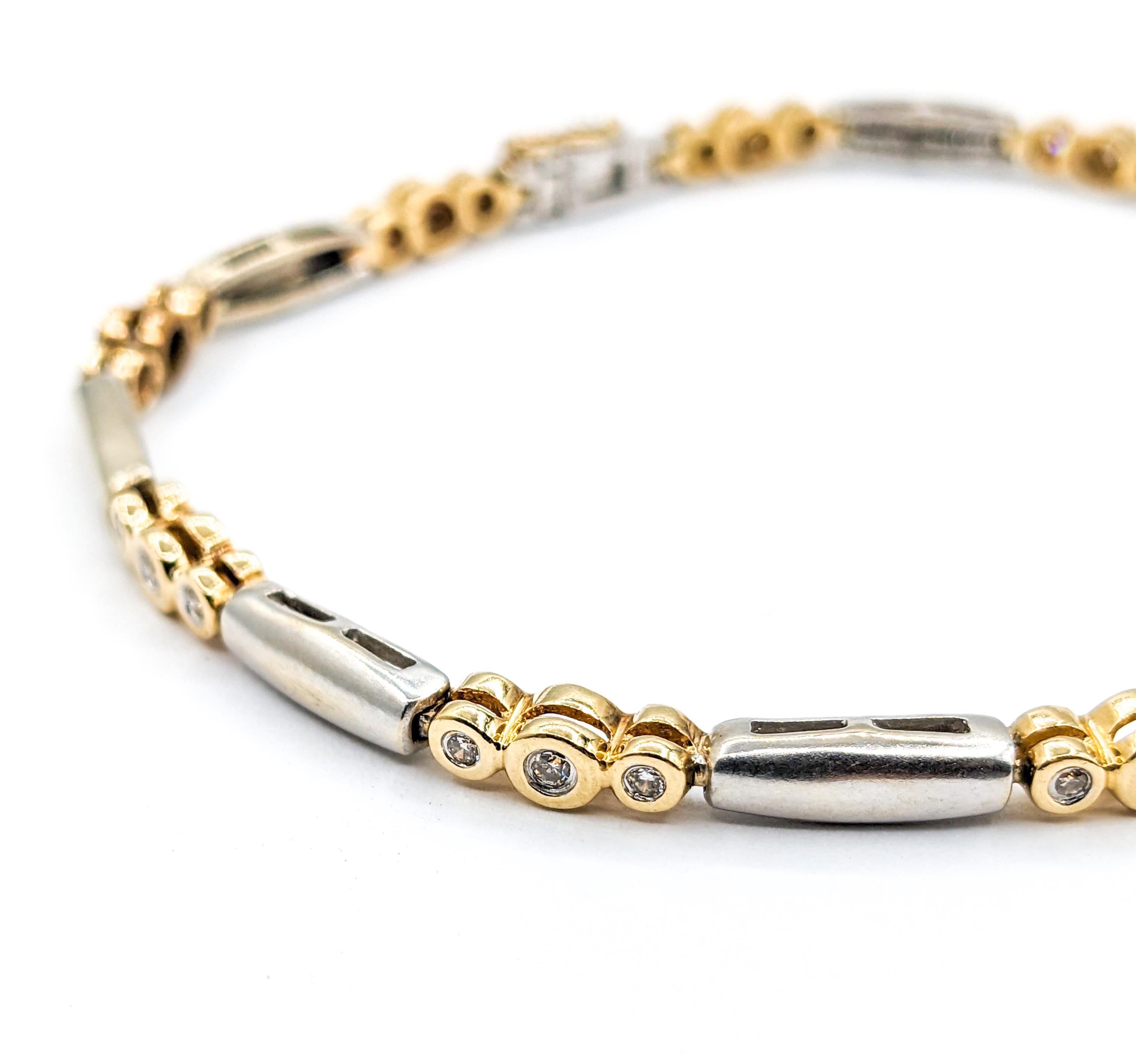 Diamond Bezel Set Bracelet Two Tone Gold

Introducing an exquisite bracelet, masterfully crafted in 14kt two tone gold, adorned with .50 carat total weight of round diamonds. These glittering diamonds boast I clarity and a near colorless white hue,