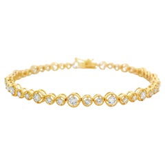 Bracelet de tennis en or jaune 14K avec chaton en diamant