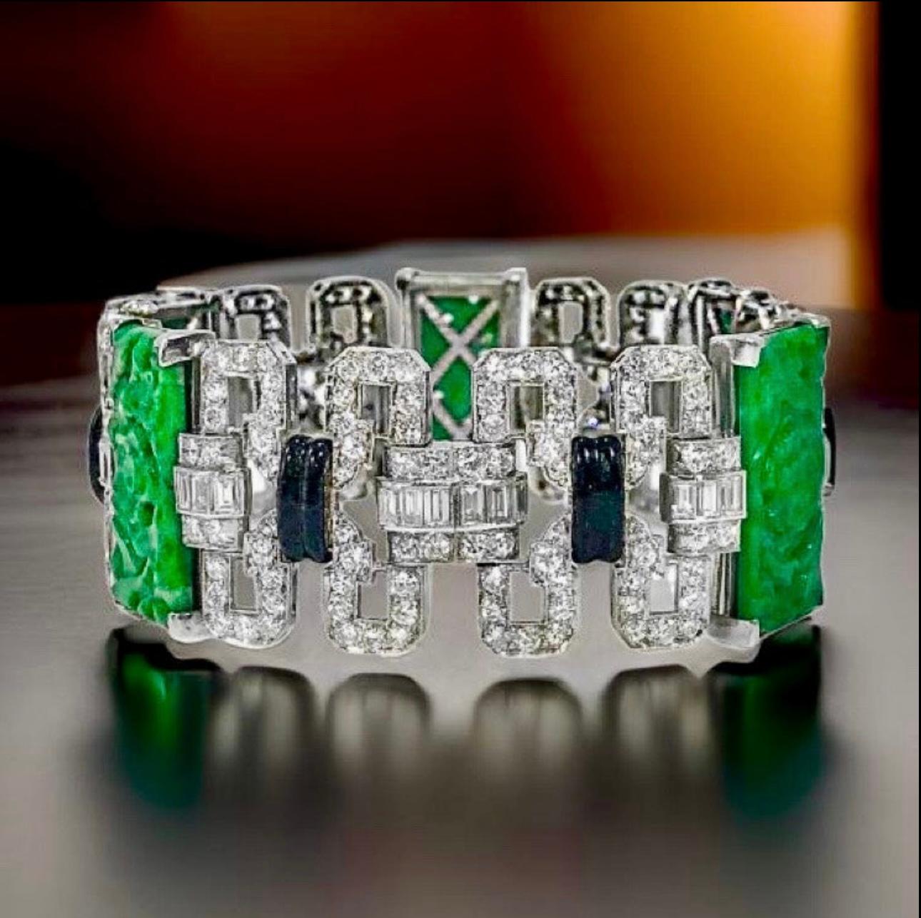 This exquisite Art Deco bracelet showcases the perfect blend of diamonds, black enamel, and carved jadeite in a platinum setting. With its timeless elegance and expert craftsmanship, this piece is sure to elevate any outfit for any occasion. Custom