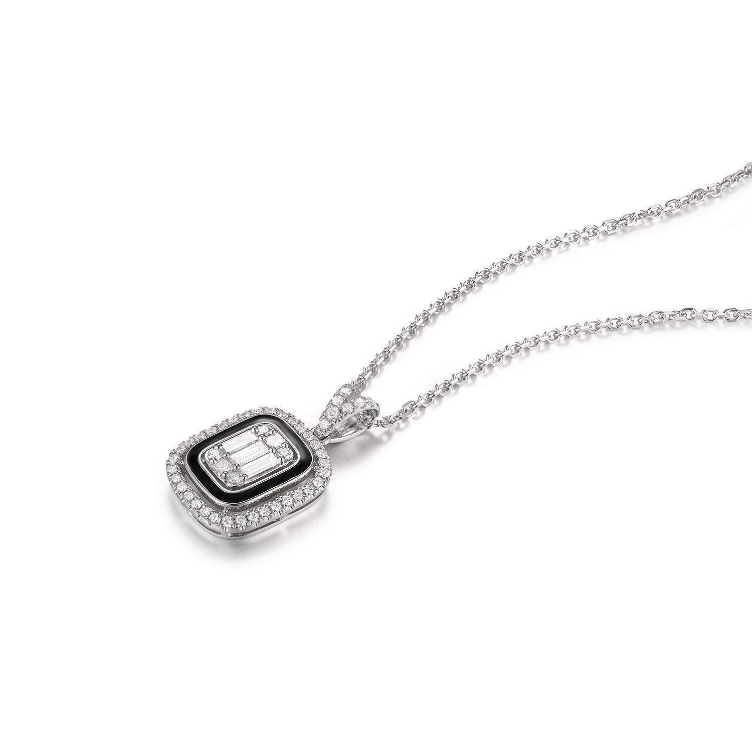 This piece is handcrafted in 18 karat white gold. This diamond pendant with chain features 3 baguette diamonds weight 0.19 carat and 0.24 carats of round diamonds. The inner halo is finish in black enamel. The length of the chain is 16.5