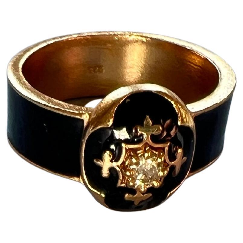 Diamond Black Enamel Ring Fleur de Lis

Ring with black Enamel, inspired by Victorian Age, Memento Mori

Designer: J Dauphin

The Fleur-de-Lis, directly inspired by the resplendent French white lily, transcends its royal roots to embody a wealth of