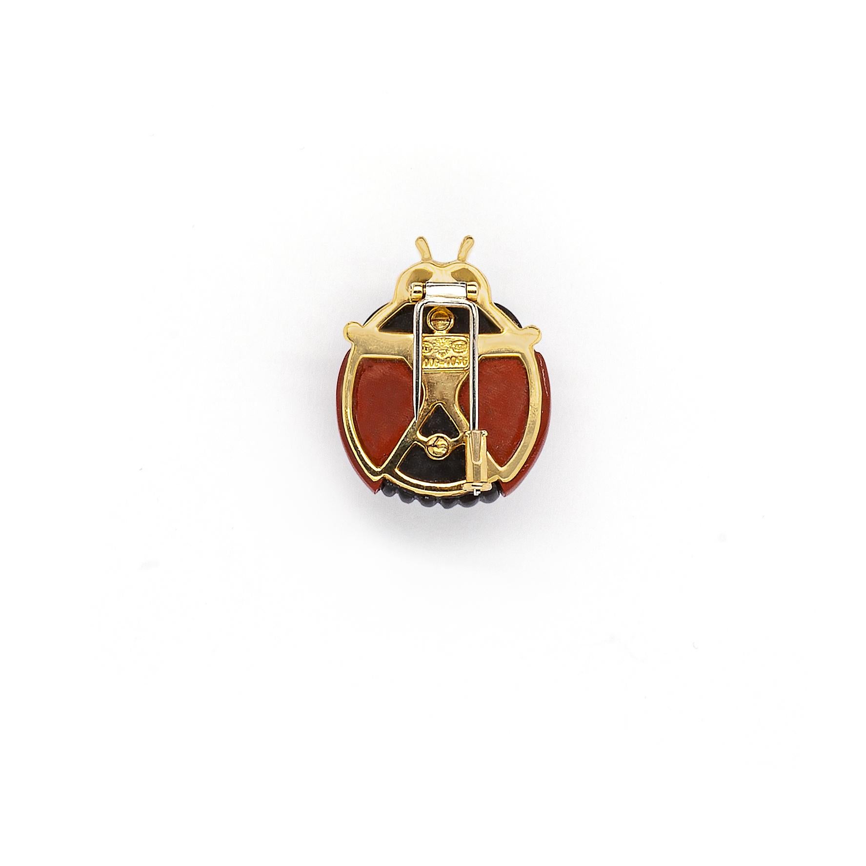 Crafted with fantastic attention to detail, this adorable ladybird brooch is sure to make heads turn!

The wonderful brooch is superbly designed as a stylised ladybug, that stands out with a captivating combination of diamonds, carnelian, black onyx