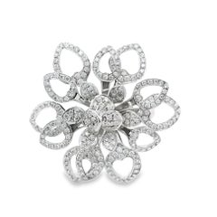 Bague fleur en or blanc avec diamant