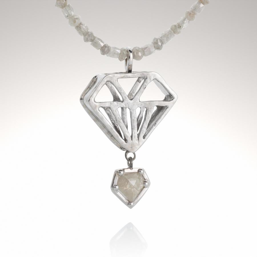 14KW and White Diamond 'Blithe Bling' Necklace with hand forged 14K white gold pendant with attached  White Diamond Charm is sure to satisfy your need for some frivolous Diamond bling ! 
The 'Blithe Bling' White Diamond Necklace is 18