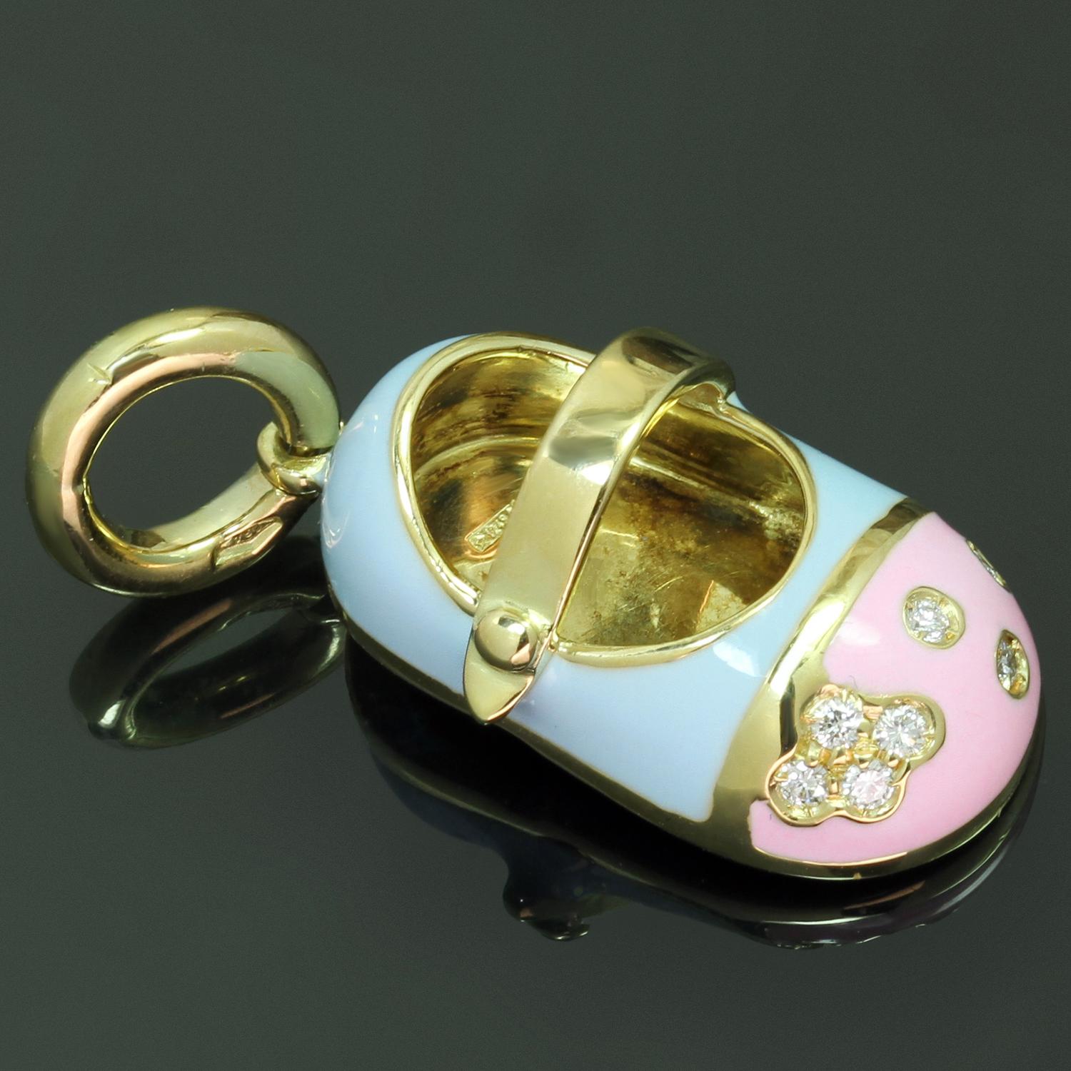 This gorgeous baby girl shoe pendant is crafted in 18k yellow gold and blue and pink enamel and is set with brilliant-cut round F-G VS1-VS2 diamonds weighing an estimated 0.16 carats. Made in Italy circa 1990s. Measurements: 0.43