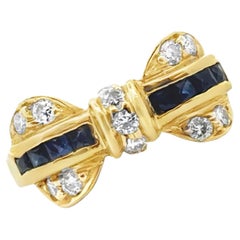 Diamond Blue Sapphire 18 Karat Yellow Gold Vintage Bow Ring