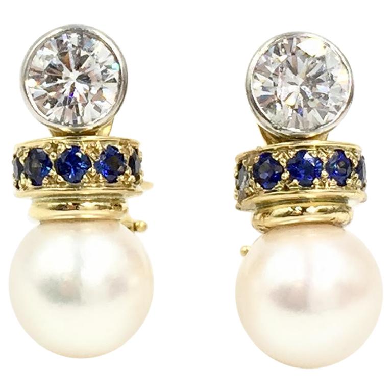 Diamond, Blue Sapphire and Pearl Drop Platinum and 18 Karat Earrings For Sale