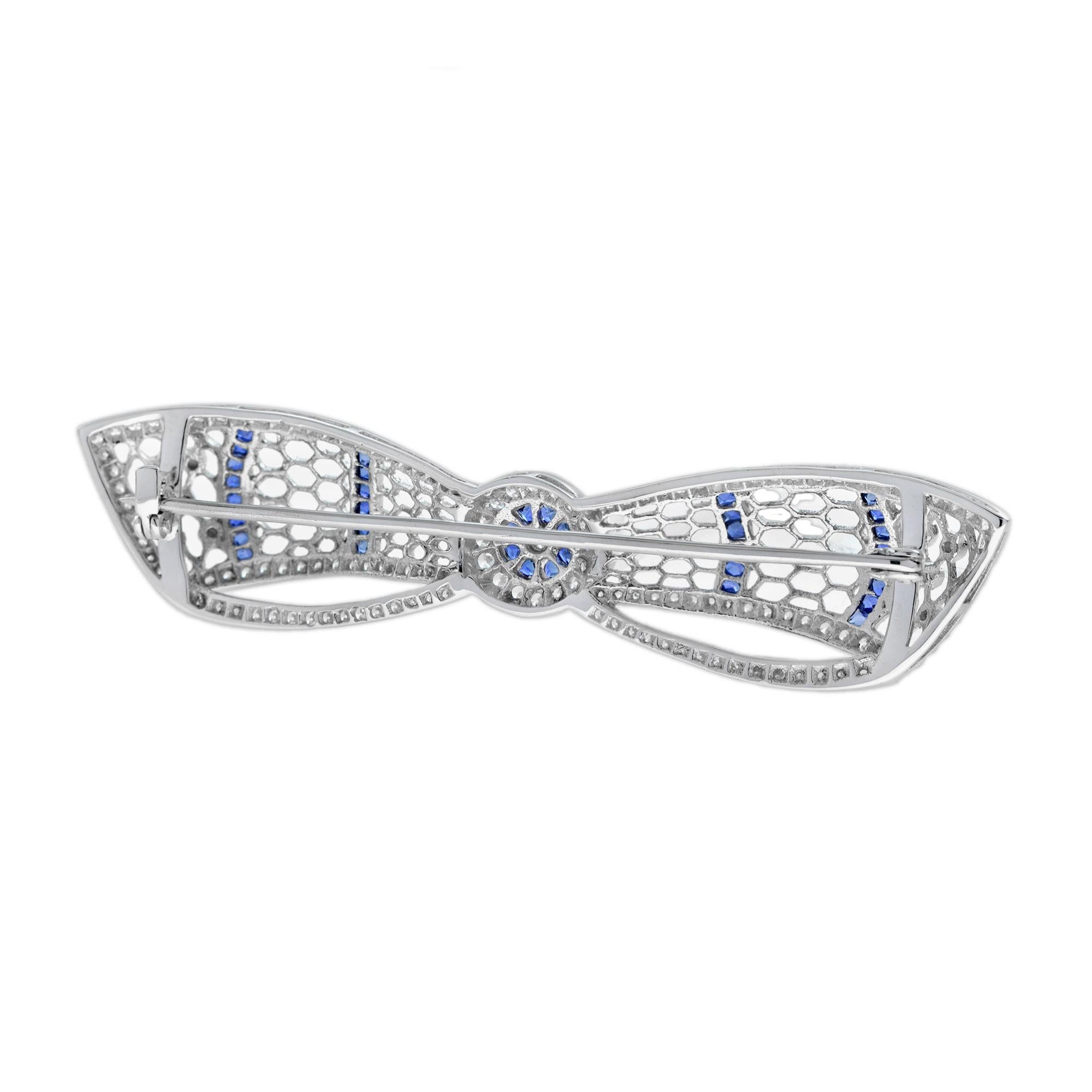 Round Cut Diamond & Blue Sapphire Art Deco Style Bow Crown 14K White Gold Pin Brooch For Sale