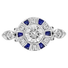 Verlobungsring aus 18 Karat Weißgold mit Diamanten und blauem Saphir im Art-déco-Stil mit Target-Diamant