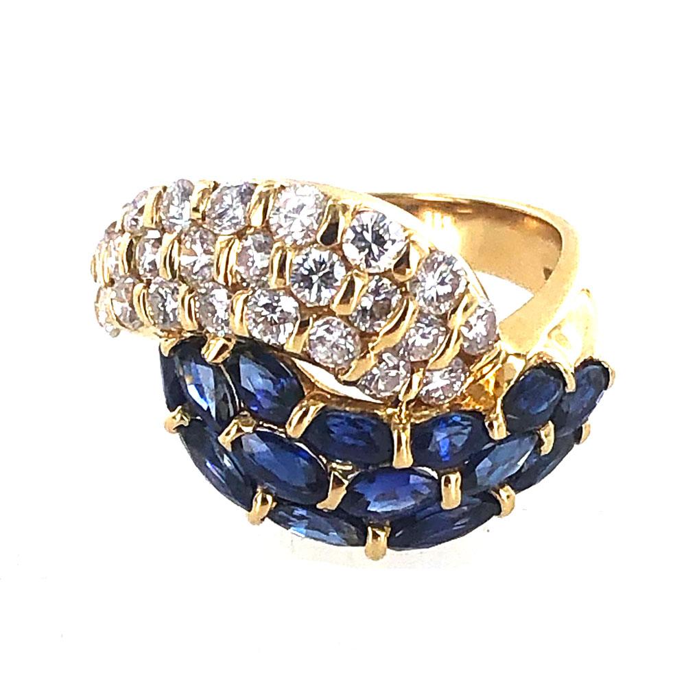 Modern Diamond Blue Sapphire Bypass 18 Karat Yellow Gold Ring