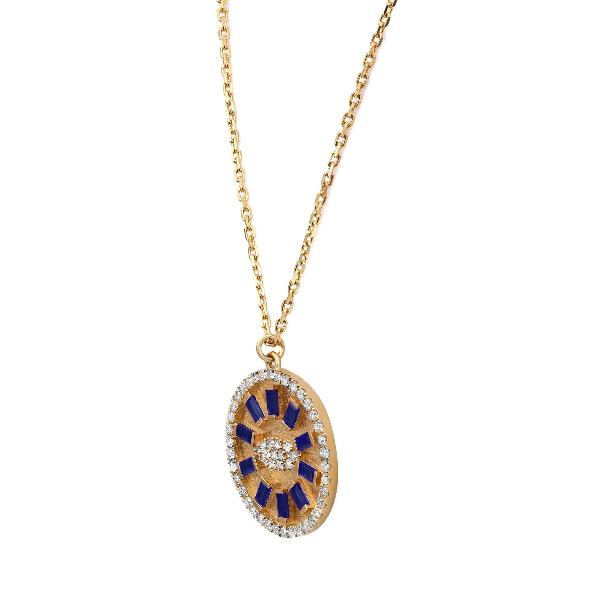Fabulous and chic, this dazzling diamond and blue sapphire pendant necklace is a standout addition to your every day and evening looks. This piece gives a touch of elegance to any ensemble you pair it with. Features 10 half bezel set baguette cut