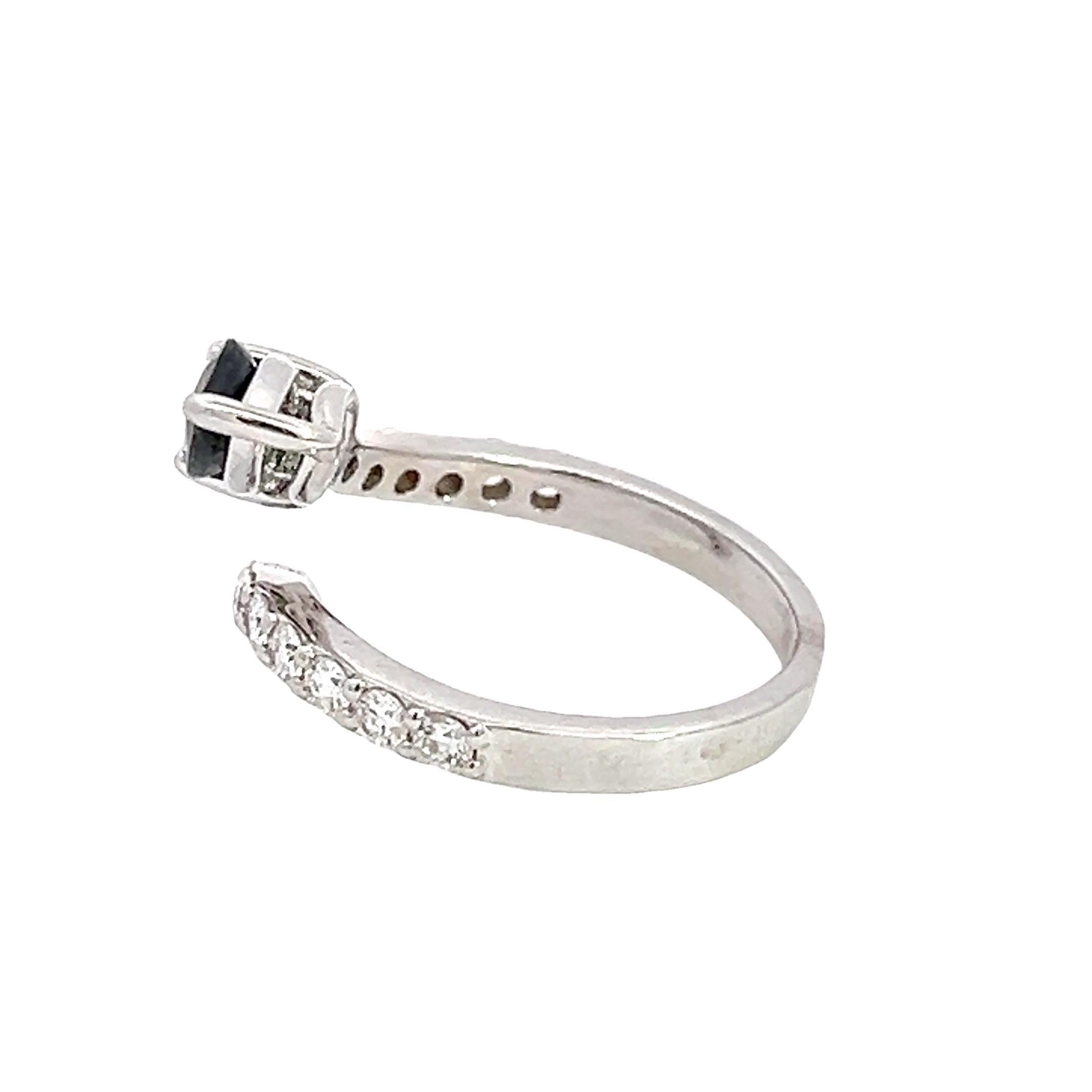 Diamond & Blue Sapphire Ring in 14K White Gold with Natural Diamonds.
This elegant ring is crafted from 14k white gold, offering a refined and modern appearance. At its heart lies a natural pear-shaped blue sapphire, approximately 1.00 carat in