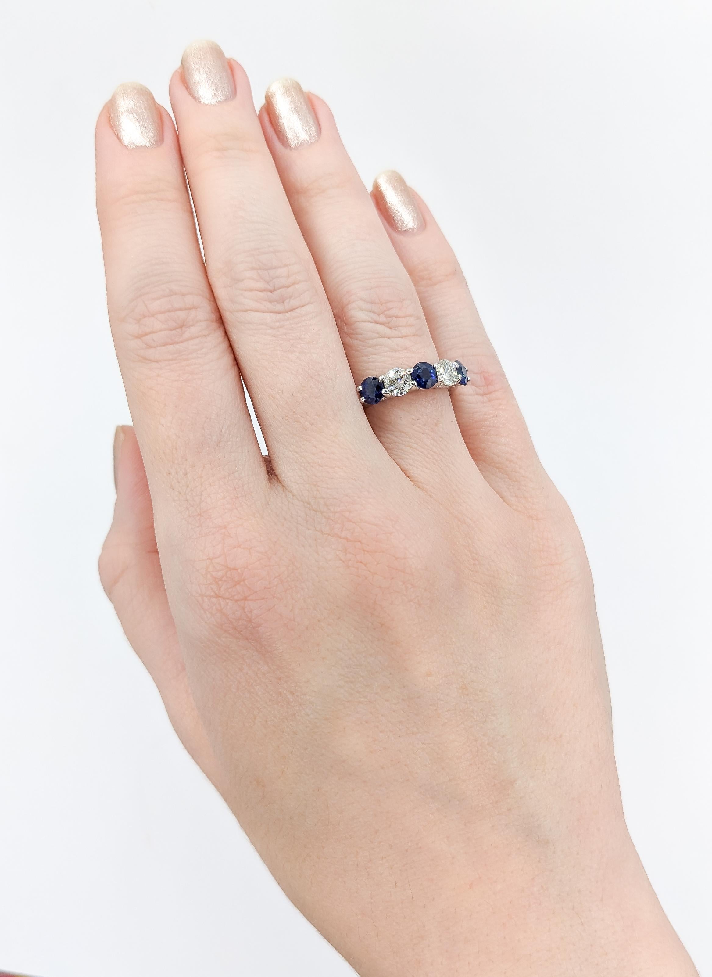 Contemporary Diamond & Blue Sapphire Ring in Platinum For Sale