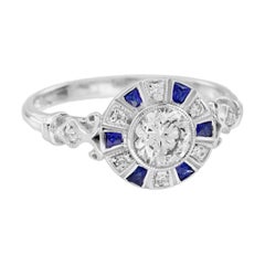 Anillo de oro blanco con diamantes y zafiro azul inspirado en la época Art Decó