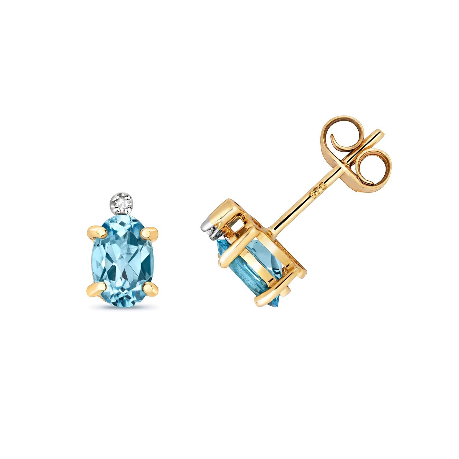 DIAMOND & BLUE TOPAZ OVAL CLAW SET STUDS IN 9CT Gold In New Condition For Sale In Ilford, GB