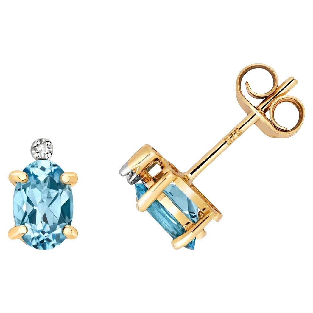 DIAMOND & BLUE TOPAZ OVAL CLAW SET STUDS IN 9CT Gold For Sale