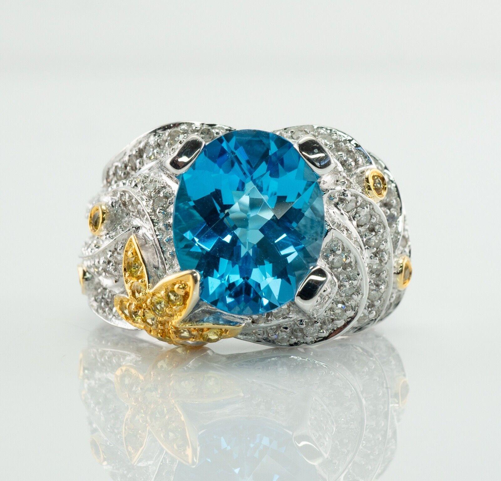 This showstopper estate ring is crafted in solid 14K White Gold. The center natural checkerboard blue Topaz measures 12x10mm (3.50 cts). This is a very clean and transparent gem of great intensity. The setting is studded with white diamonds and
