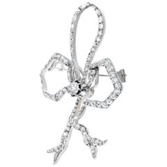 Diamond bow 18k white gold brooch