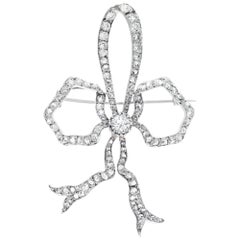 Diamond bow 18k white gold brooch