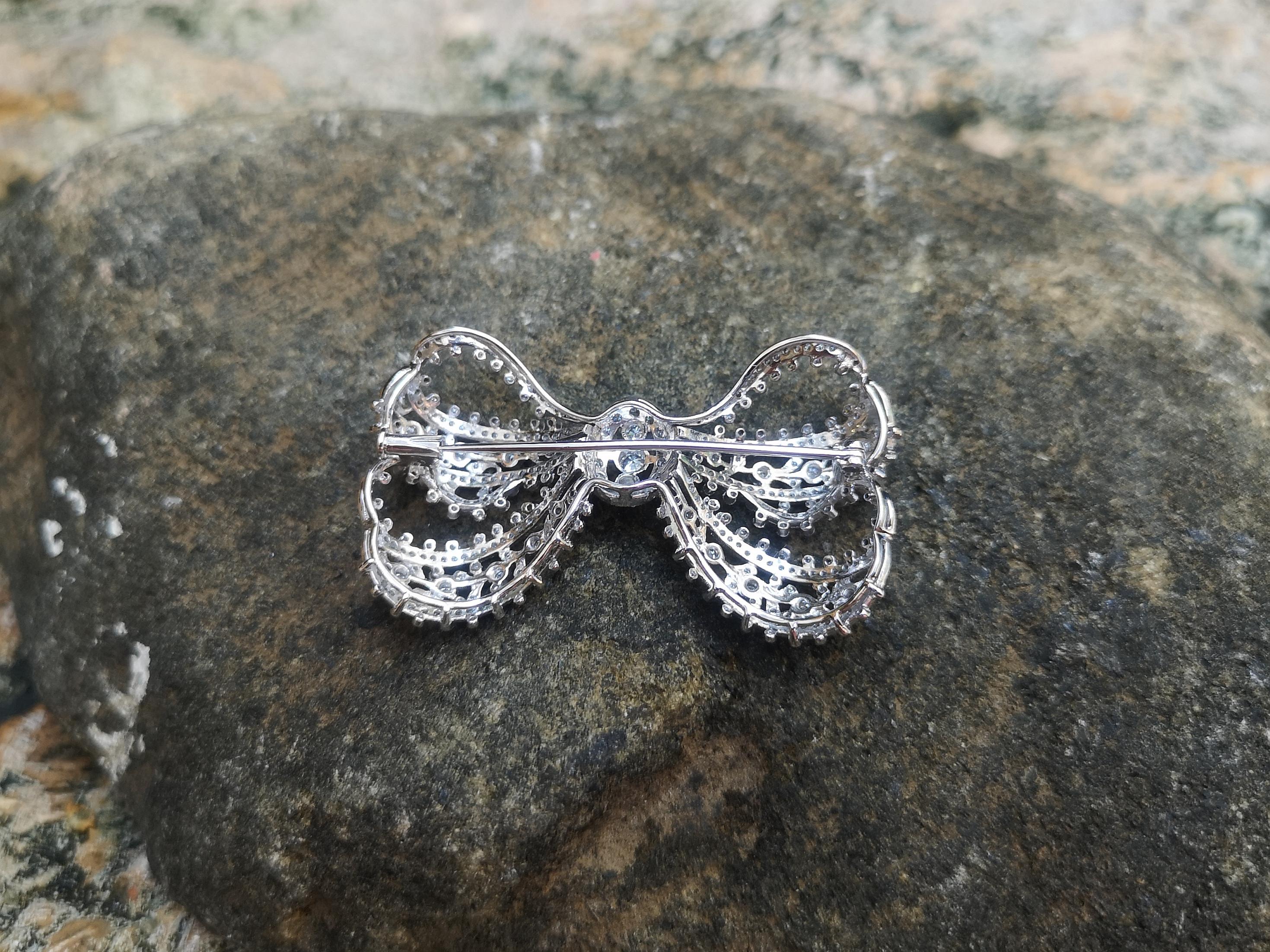 Mixed Cut Diamond Bow Brooch Set in 18 Karat White Gold Settings For Sale
