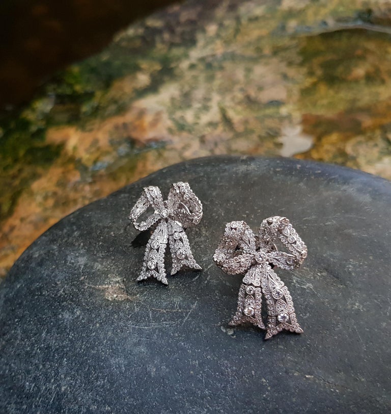 Diamond Bow Ribbon Earrings set in 18 Karat White Gold Settings For
