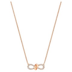 Collier à nœud de ruban en or 18 carats avec diamants