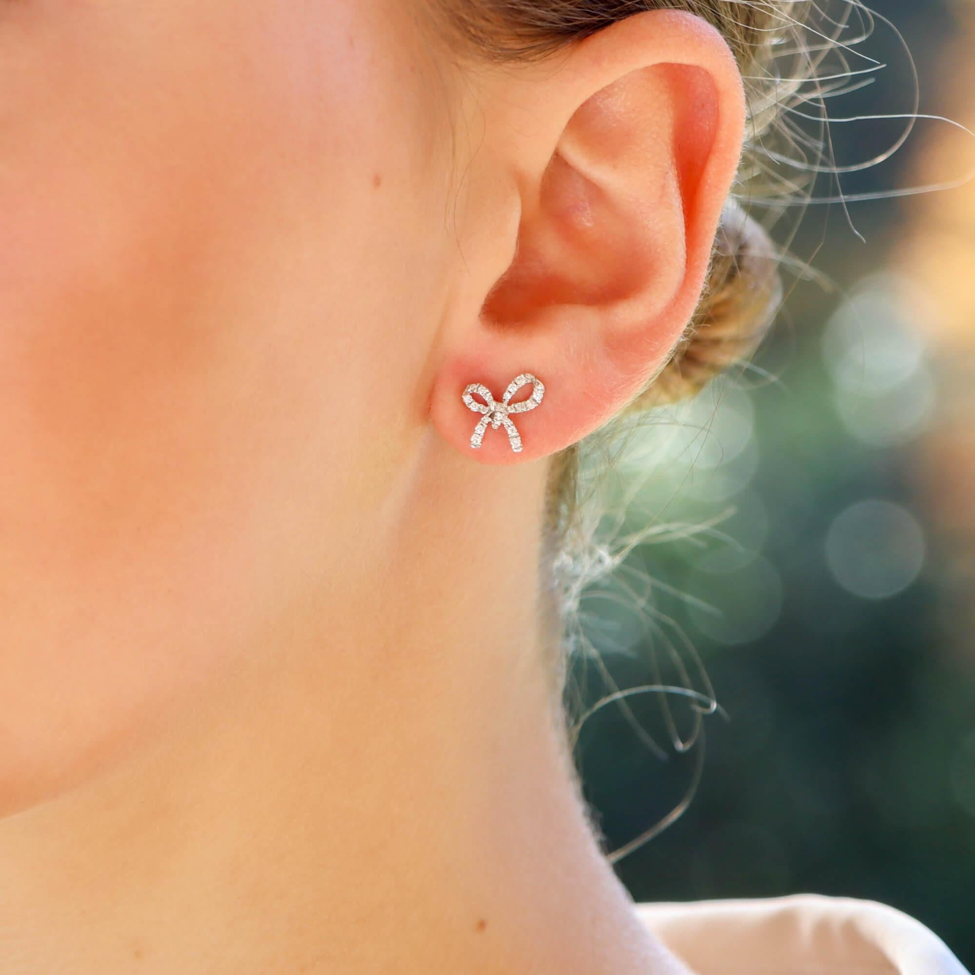 Diamond Bow Stud Earrings Set in 18k White Gold For Sale at 1stDibs