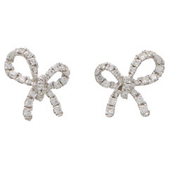 Orecchini con fiocco di diamanti in oro bianco 18 ct.