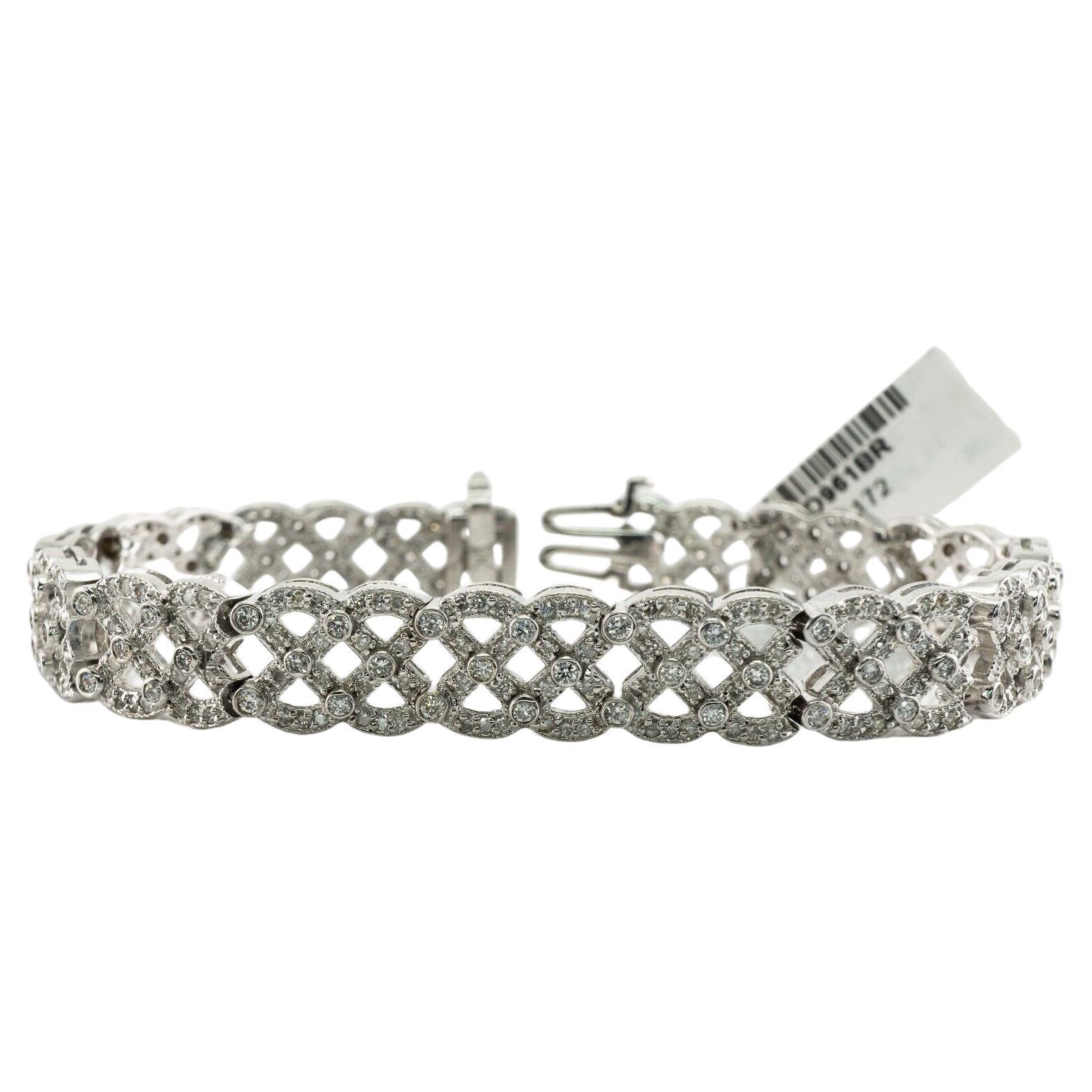 Diamond Bracelet 14K White Gold Lattice Wide 4.50 TDW

This gorgeous bracelet is finely crafted in solid 14K White Gold and set with white and fiery diamonds. The tag is attached. The bracelet is studded with 390 natural diamonds. These gems are SI2