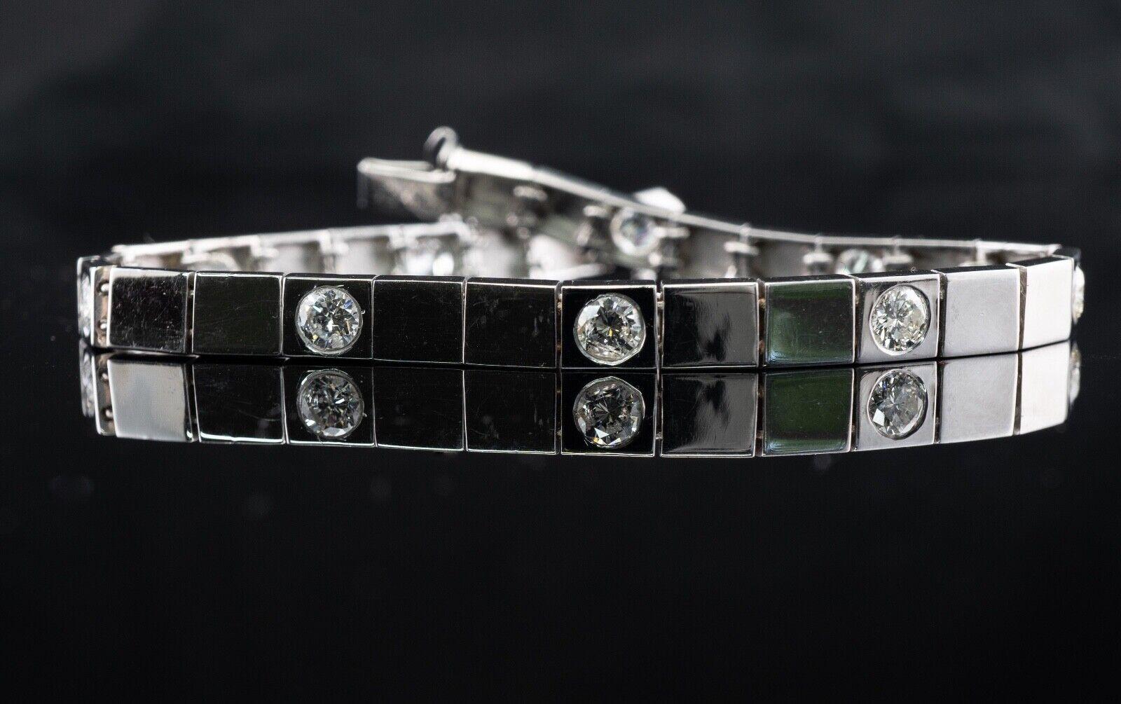 Diamond Bracelet 14K White Gold Link 2.70 TDW

This estate solid 14K White Gold bracelet is set with nine white and fiery round brilliant cut diamonds. The diamonds are SI2 clarity and HI color. The total weight is 2.70 carats. The bracelet has a