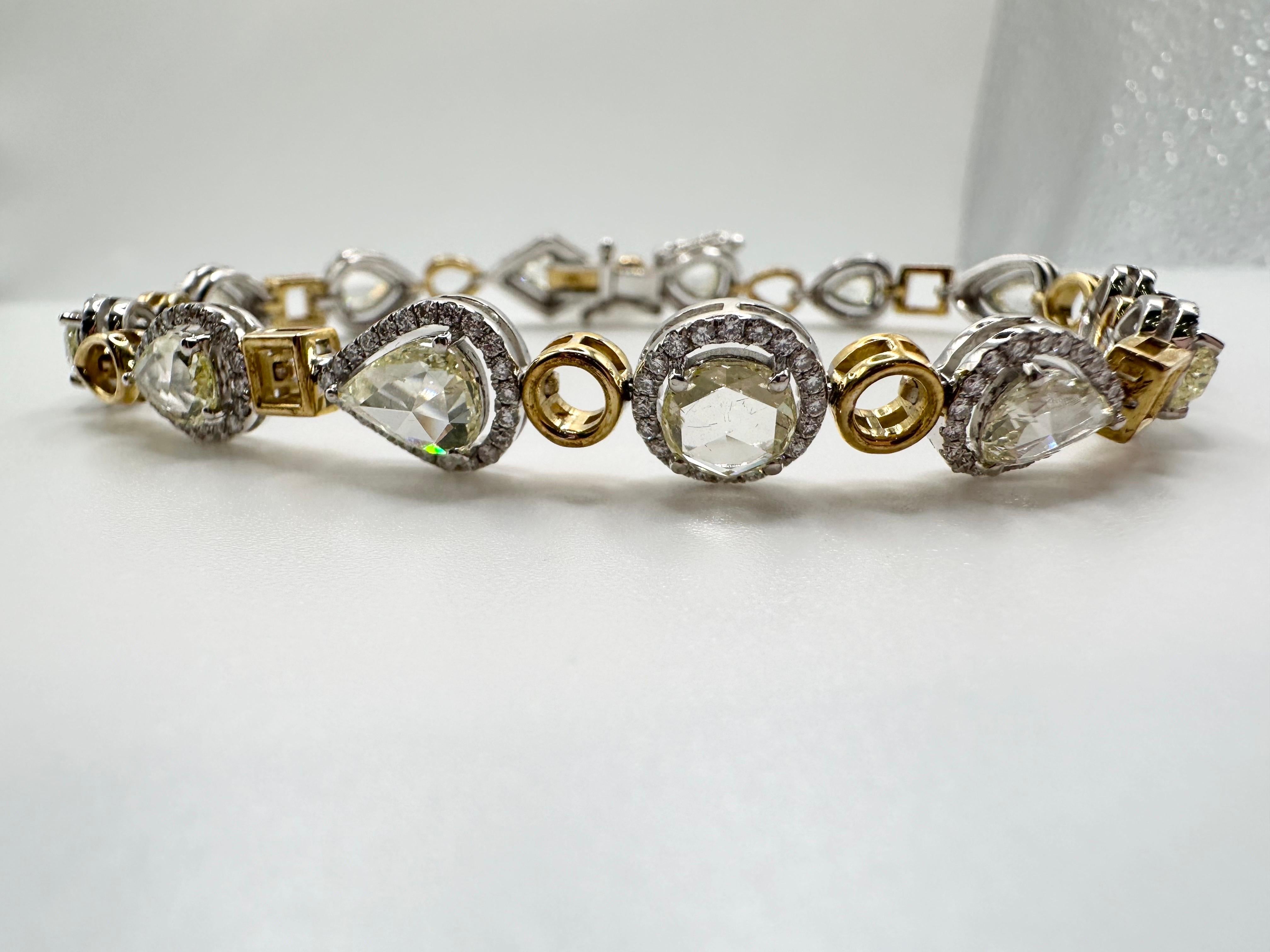Fancy diamond bracelet with over 7 carats of diamonds, gentle rose cut diamonds in 18KT white and yellow gold, bracelet is standard at 6.5 inches but can be extended if needed. 

*Item will come with a beautiful packaging and certificate of