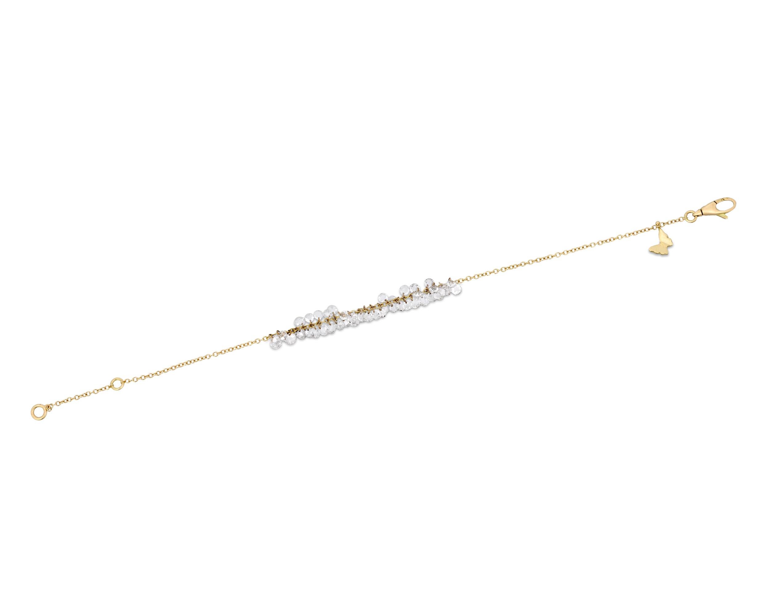 An array of rose-cut diamonds weighing 2.02 carats dazzle in this contemporary take on the classic diamond bracelet. Each diamond is individually linked to the 18K yellow gold chain for maximum movement and sparkle.

7