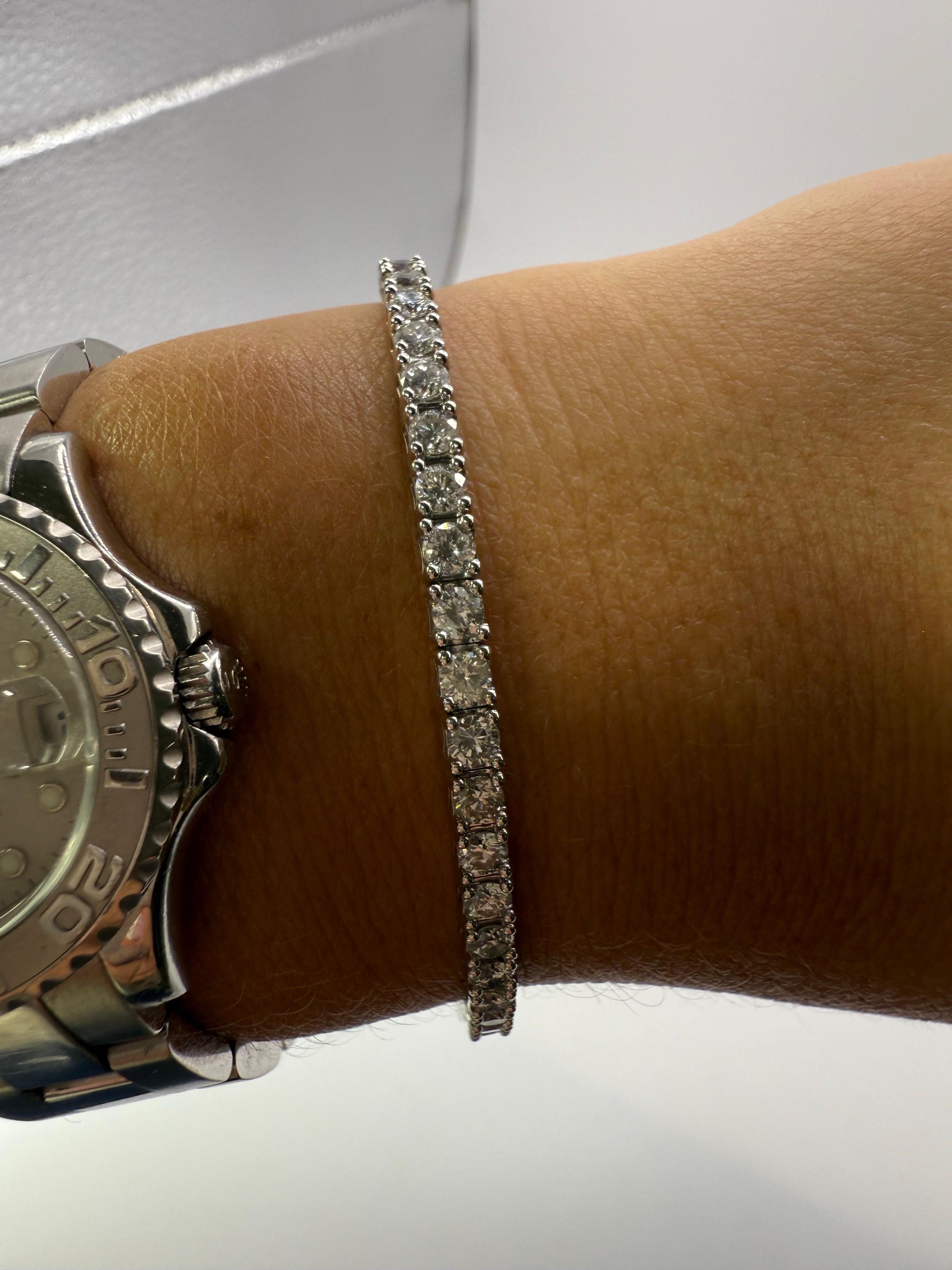 New technology! Fits most wrists, this is a natural diamond bracelet totaling 2.45 carats, stunning, very comfortable and flexible, the technology is so great it is proven to last longer than average bracelets. The bracelet is just over 7 grams in