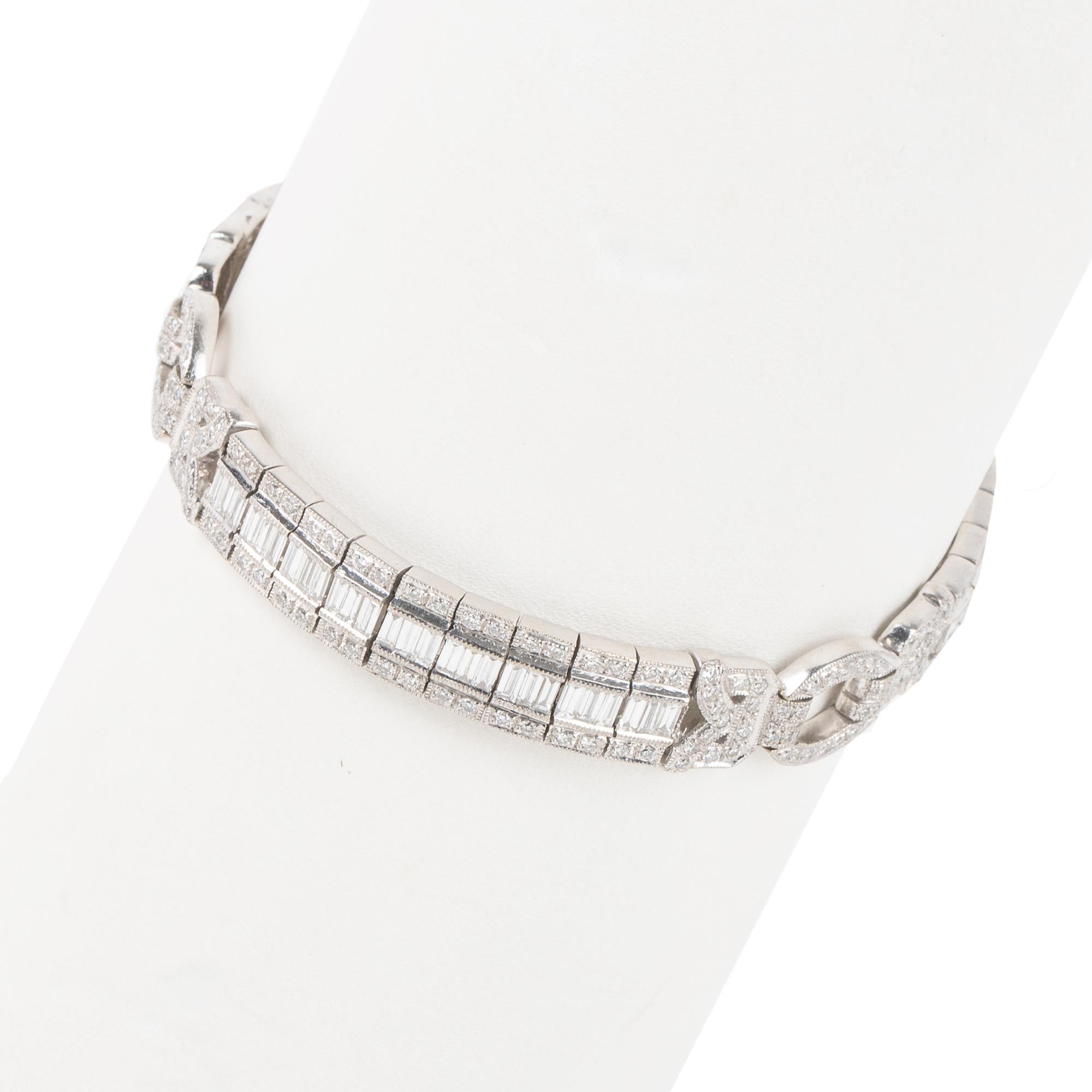 This special bracelet shows art deco style at its best. The diamonds are round and baguette cut set in 18k white gold.

Appraisal - $14,900
Diamond weight - 8.5 carats